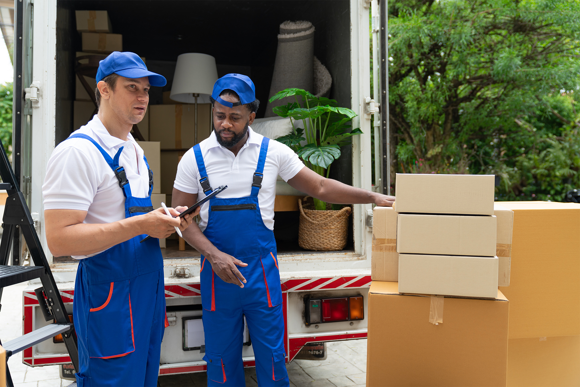 man-mover-worker-in-blue-uniform-check-lists-on