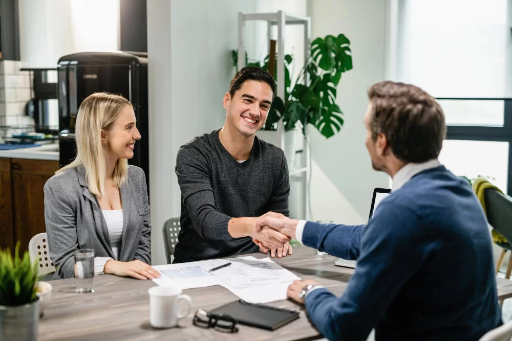 removal-services-business-people-shaking-hands-in-meeting