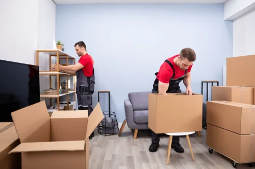 Corporate Removal Group crew loading office equipment for a commercial relocation